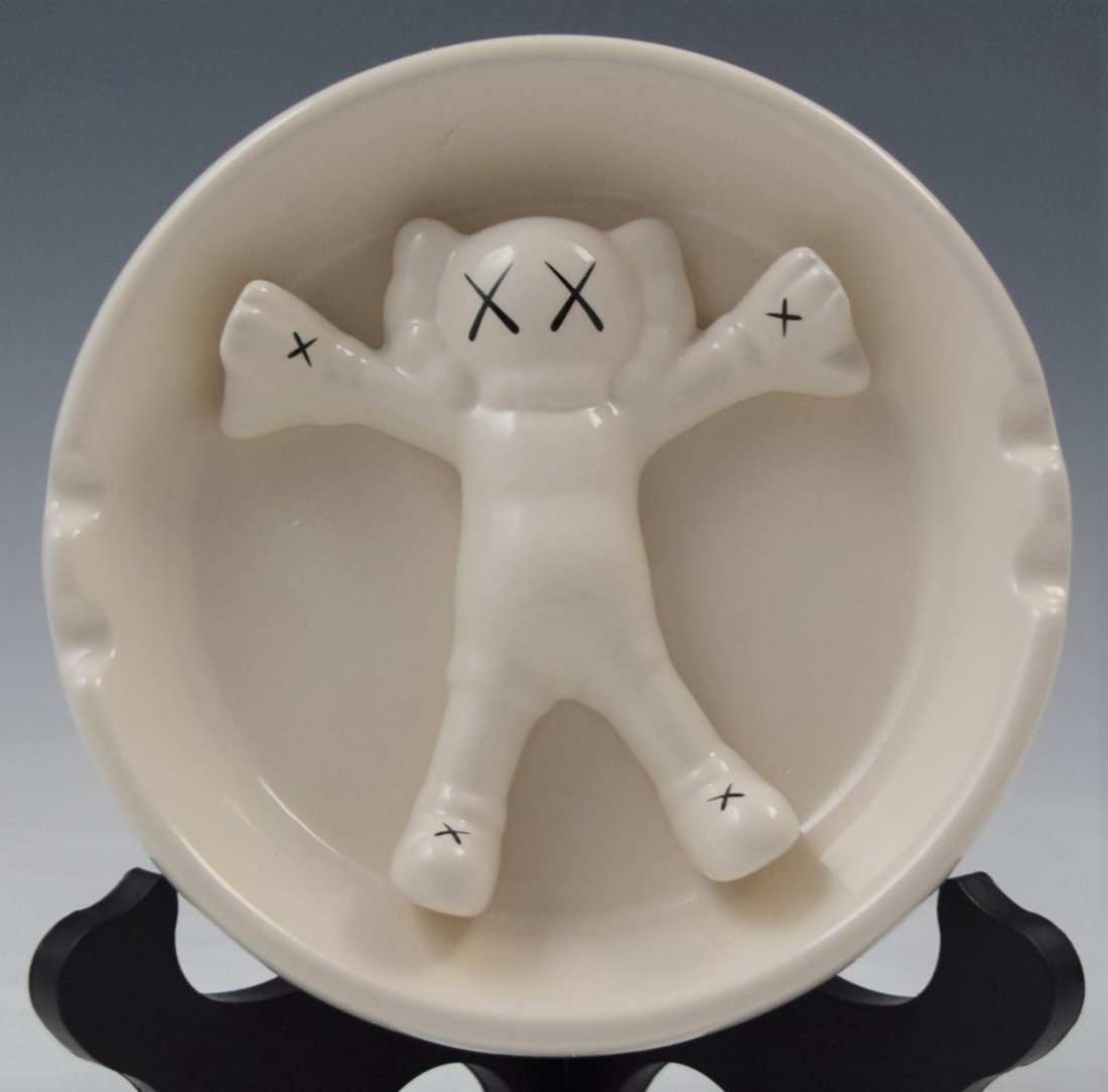Kaws, Art Ashtray (White Ceramic): KAWS (AMERICAN) White, ceramic ashtray with original box, limited edition 6"