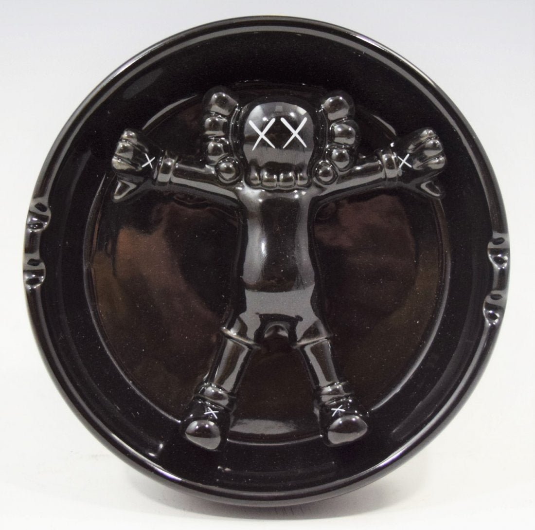 Kaws, Art Ashtray (Black Ceramic): KAWS (AMERICAN) Black, ceramic ashtray with original box, limited edition 6"