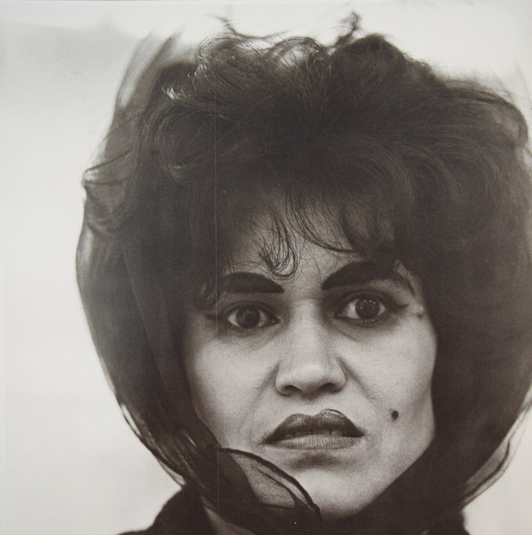Diane Arbus - Puerto Rican Women With Beauty Mark, NYC: DIANE ARBUS (1923-1971) Puerto Rican Women With Beauty Mark, NYC Print in black and white, 1972 Printed in America 8 3/8" x 8 3/8"