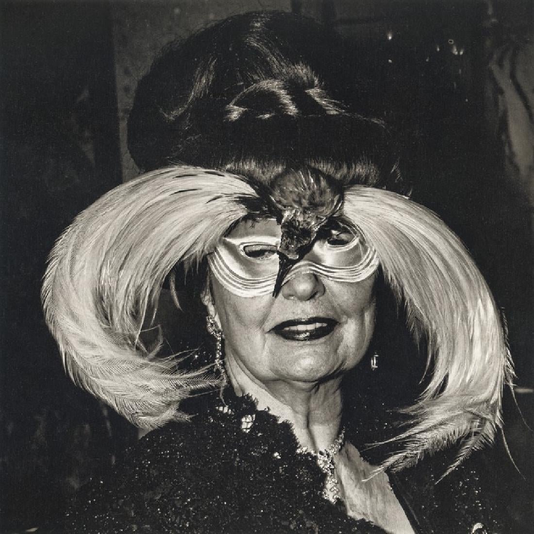 Diane Arbus - A Woman in Bird Mask, NYC, 1967: DIANE ARBUS (1923-1971) A Woman in Bird Mask, NYC, 1967 Photo-litho 8 1/4" x 8 1/4"