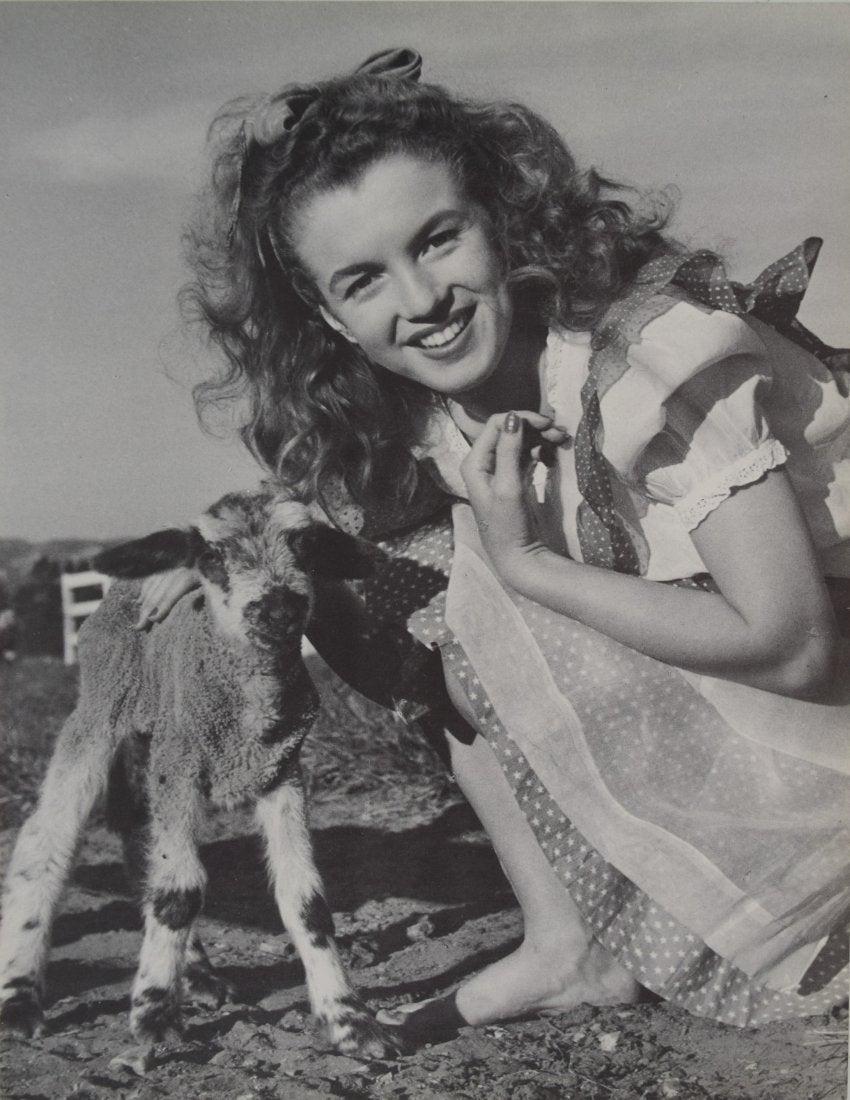 Andre de Dienes - Marilyn Monroe w/Goat: ANDRE DE DIENES (1913-1985) Marilyn Monroe w/Goat Photogravure c.1985 Printed in America 12" x 9 1/2"
