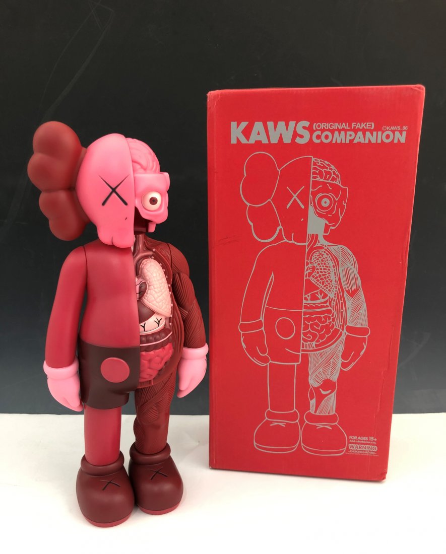 Kaws - Dissected Companion Figure: KAWS (B. 1974) Dissected Companion Painted cast vinyl 14-3/4" x 6-1/4" x 3-1/4" Stamped on the underside of the feet Produced by Medicom Toy and OriginalFake, Tokyo