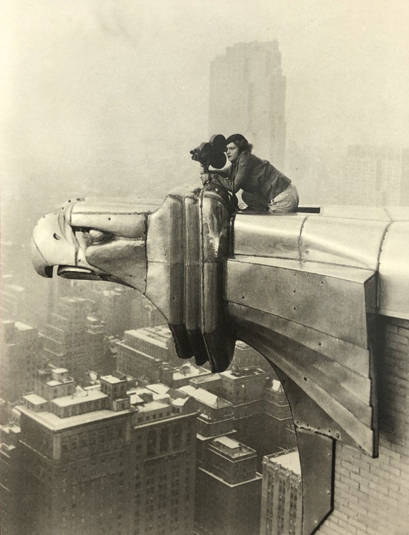 Oscar Graubner - Margaret Bourke-White atop Chrysler: OSCAR GRAUBNER Margaret Bourke-White atop the Chrysler Building. c. 1930 Photo-litho 7 1/2" X 5 1/2"