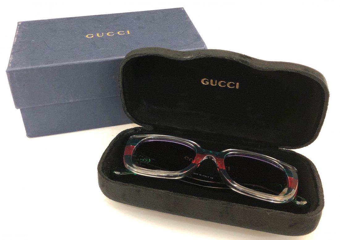 Gucci Sunglasses: GUCCI (ITALIAN) Sunglasses issued by Gucci with case and cloth