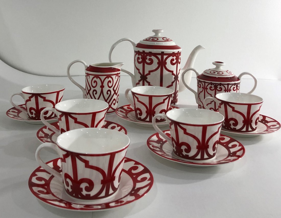 Hermes Balwn du Guadalquivi Tea Set (15 Pieces): HERMES (PARIS) Balwn du Guadalquivi tea set consisting of 6 teacups/saucers, coffee pot, etc Each piece marked to backside 7"h teapot; 4 1/2" creamer; 4" sugar; 2 1/2" cup; 6" saucer
