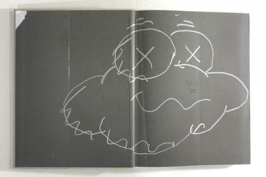 Attributed to Kaws - Untitled, Drawing (Rizzoli Book): ATTRIBUTED TO KAWS (B. 1974) Untitled Marker on paper 11" x 13" Unsigned Executed inside a "Rizzoli" art book