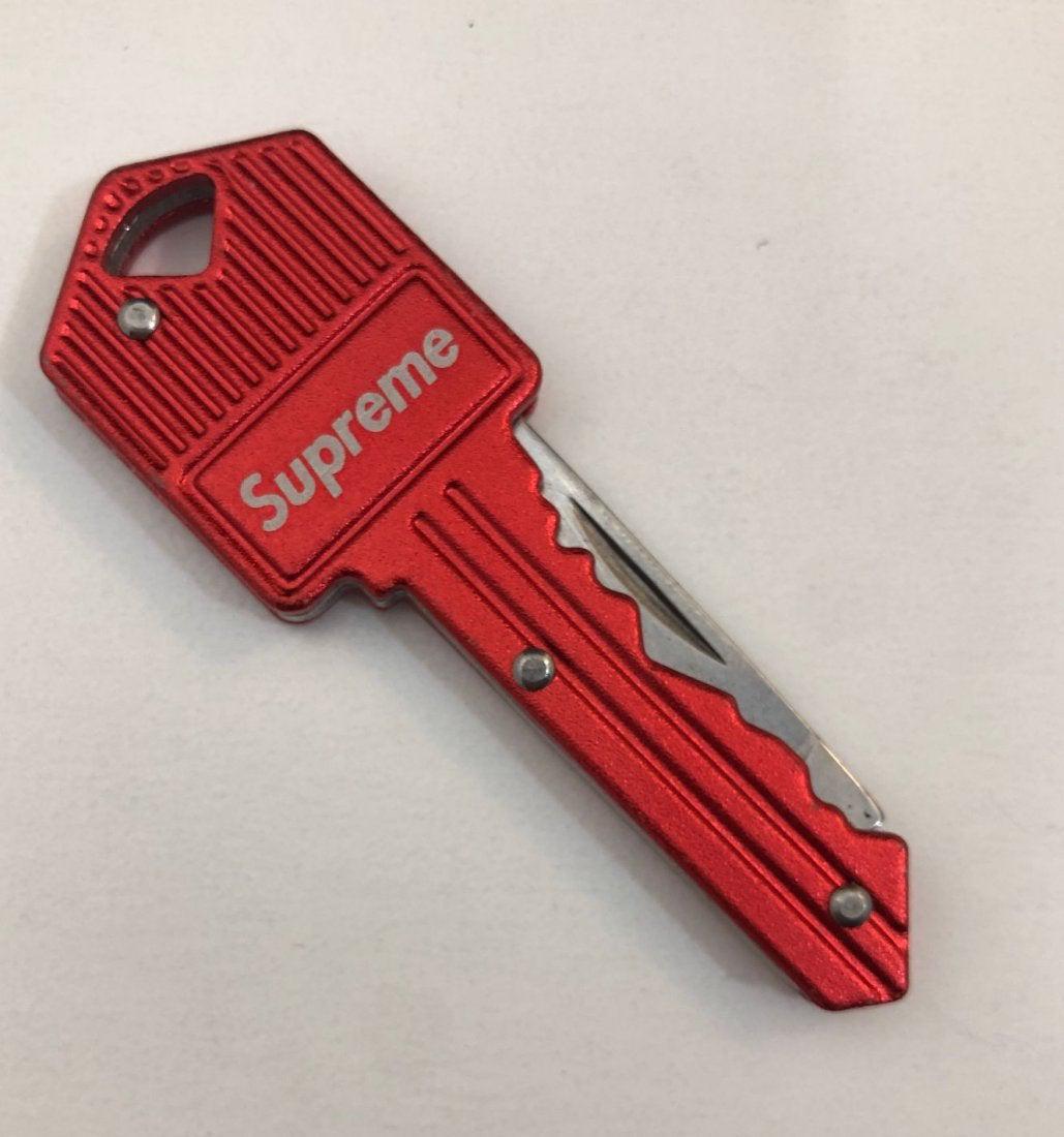 Supreme Key Knife Red: SUPREME Key knife issued by Supreme