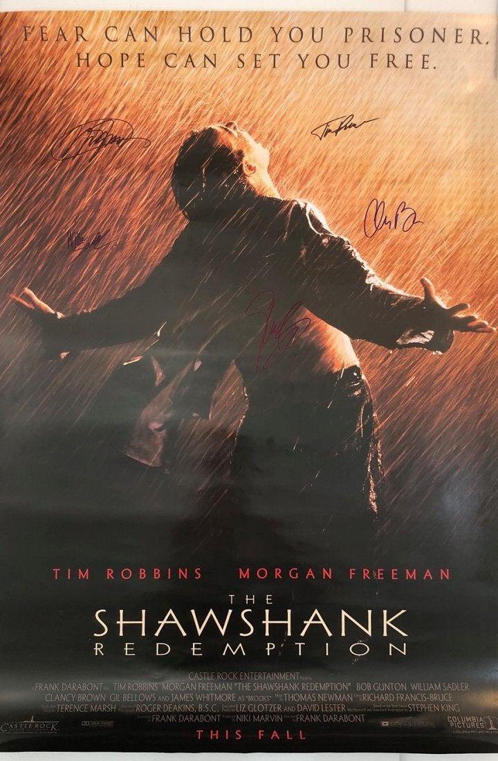 Shawshank Redemption Movie Poster (Cast Signed): SHAWSHANK REDEMPTION Movie poster signed by the cast of Shawshank Redemption, 5 signatures including Morgan Freeman and Tim Robbins 38" x 27"