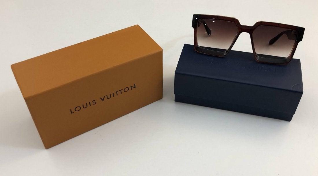 Louis Vuitton 1.1 Millionaires Sunglasses (w/box): 1.1 millionaires sunglasses, square shaped with bevel design on front, gold-colored monogram to top. Includes box, case and cloth with bag.