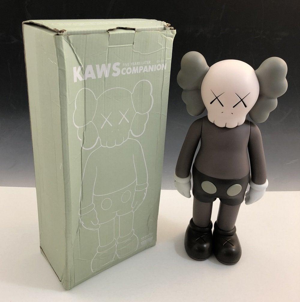 Kaws Companion Figure Open Edition 2018: KAWS (B. 1974) Companion Painted cast vinyl 14-3/4" x 6-1/4" x 3-1/4" Stamped on the underside of the feet Produced by Medicom Toy and OriginalFake, Tokyo