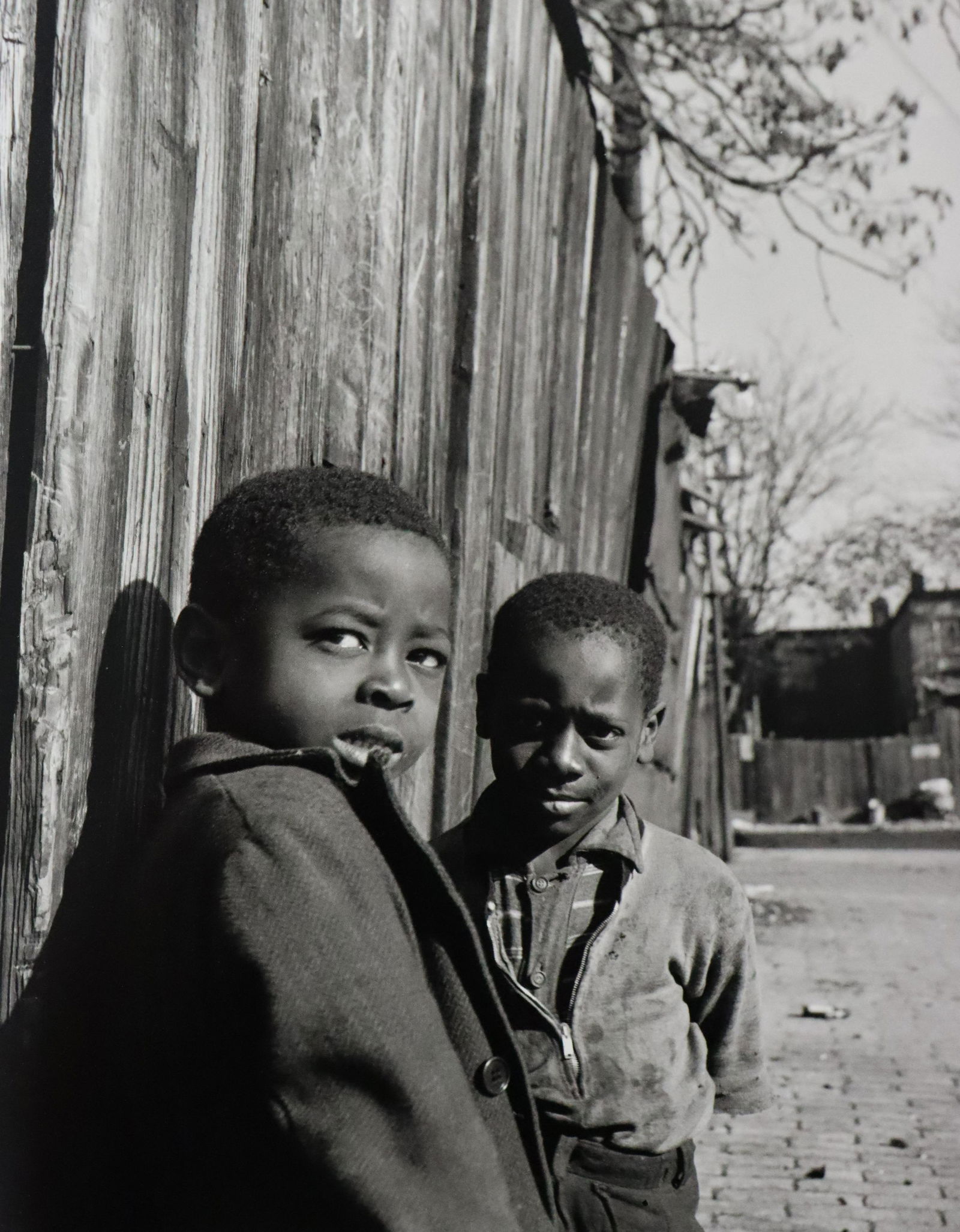 Gordon Parks - Two Negro Boys, Photo-Litho: GORDON PARKS - (1912-2006) Two Negro Boys, Washington, D.C. Photo-Litho Printed later 20th Century 8 3/4" x 7" (Image Size)