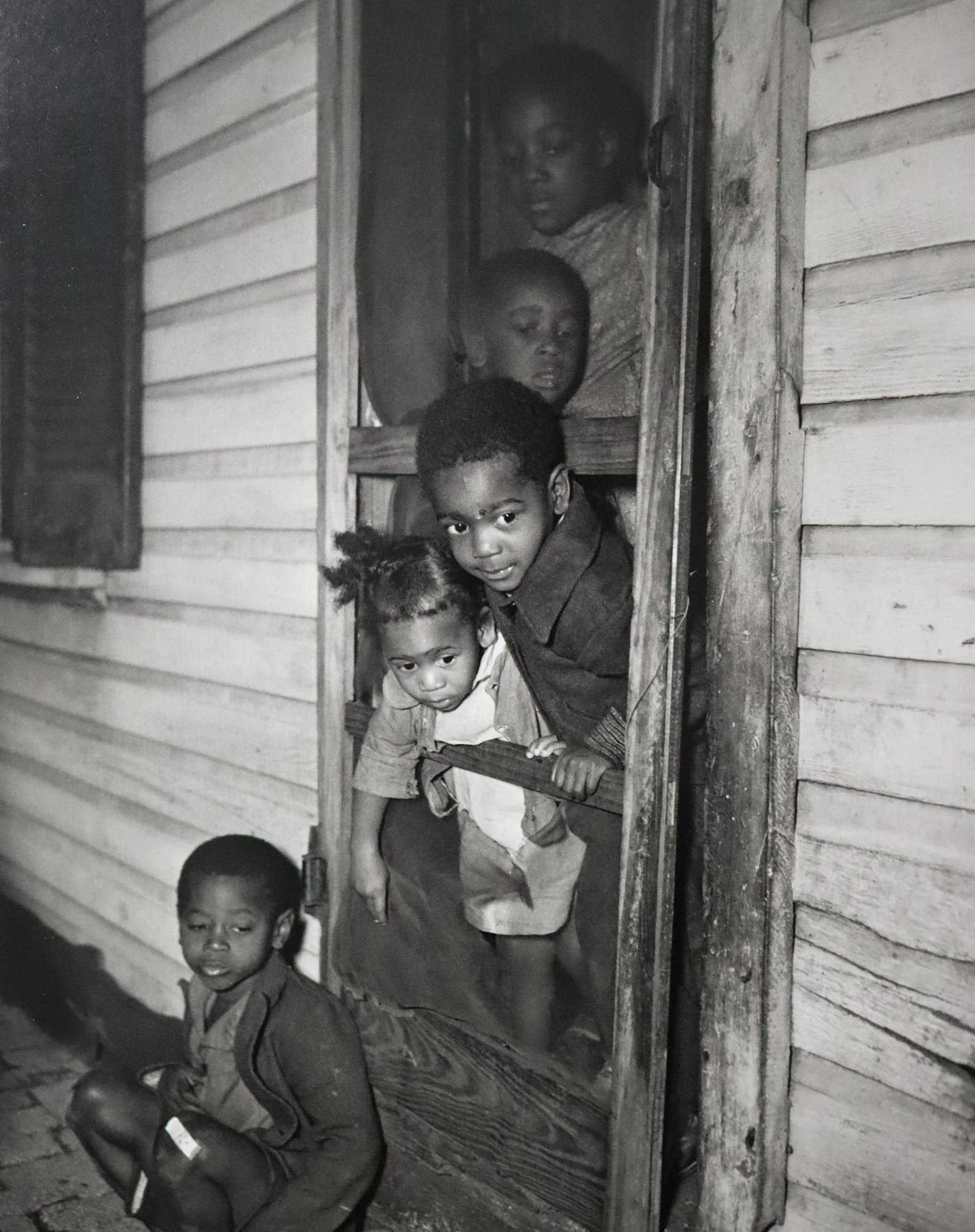 Gordon Parks - Negro Children at Home, Photo-Litho: GORDON PARKS - (1912-2006) Negro Children at Their Home, Washington, D.C. Photo-Litho Printed later 20th Century 9" x 7" (Image Size)