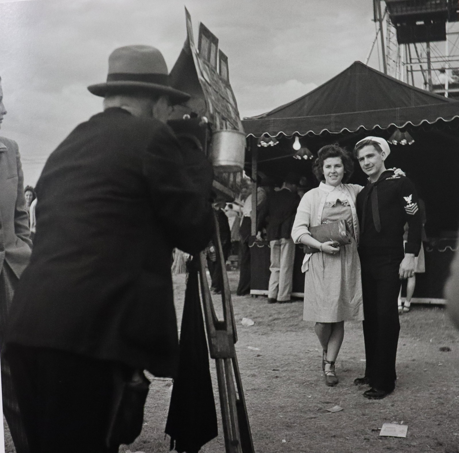 Gordon Parks - Sailor and Sweetheart, Photo-Litho: GORDON PARKS - (1912-2006) Sailor and His Sweetheart, Windsor County Fair, Augusta, Maine Photo-Litho Printed later 20th Century 7" x 7" (Image Size)