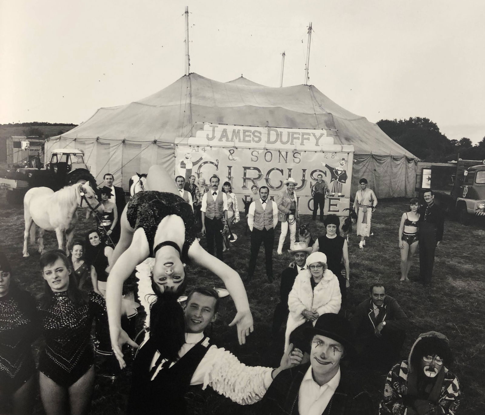 Bruce Davidsons - The Duffy Circus, Photo-Litho: BRUCE DAVIDSON - (B. 1946) The Duffy Circus, Ireland Photo-Litho Printed circa later third quarter 20th century 7 3/4" x 9 5/8" (Image Size)