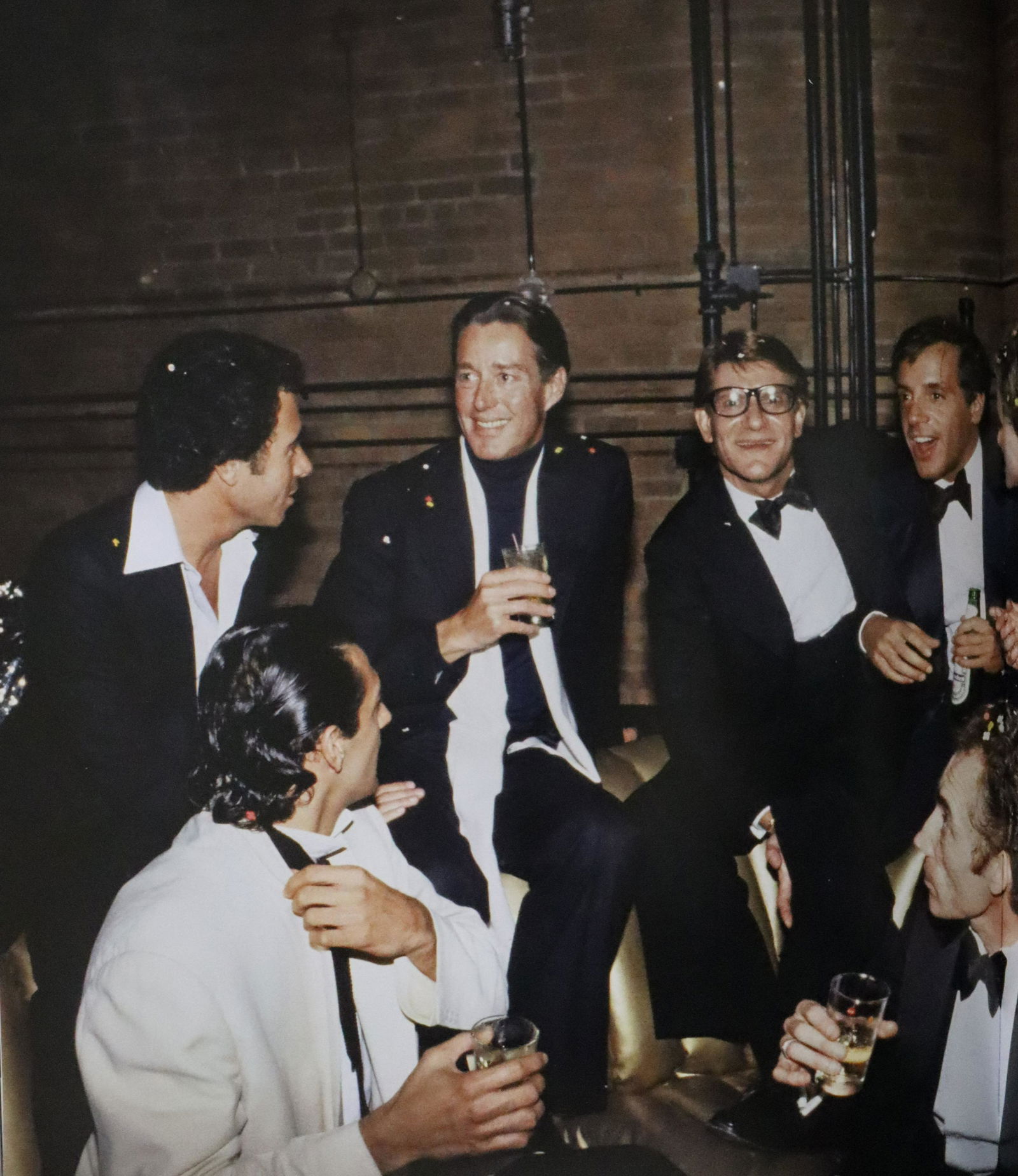 Yves Saint Laurent, Studio 54, Photo-Litho: UNKNOWN PHOTOGRAPHER Yves Saint Laurent with David Geffen, Halston, Steve Rubel, Nan Kempner, D.D. Ryan and Fernando Sanchez, Studio 54 Photo-Litho Printed circa late 20th century 13 5/8" x 11 1/4" (I