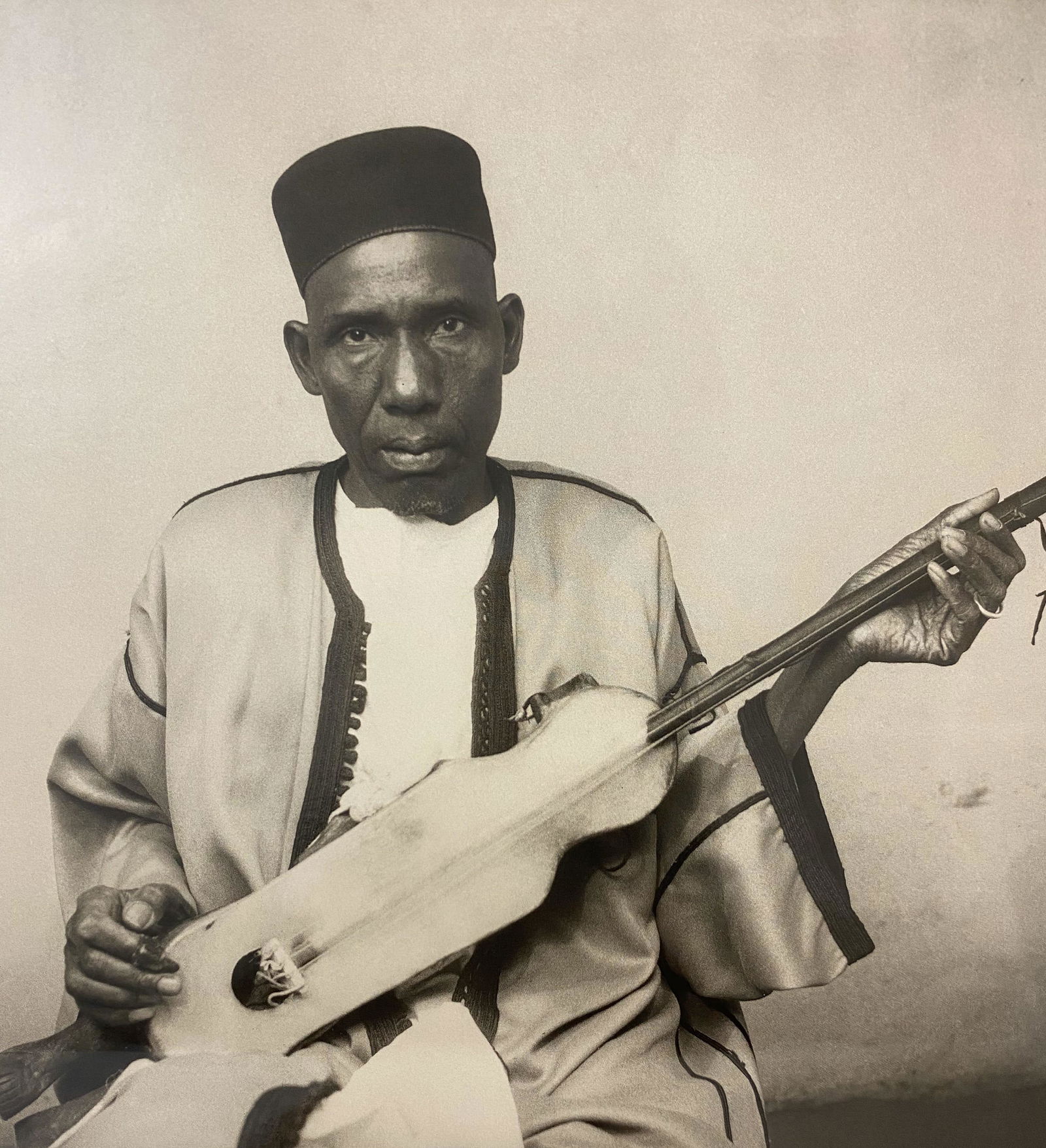 Malick Sidibe â€œOlder Man with guitarâ€ Photo Litho: MALICK SIDIBE (1935-2016) Older man with a guitar Photo litho 7 1/4" x 7 1/4"