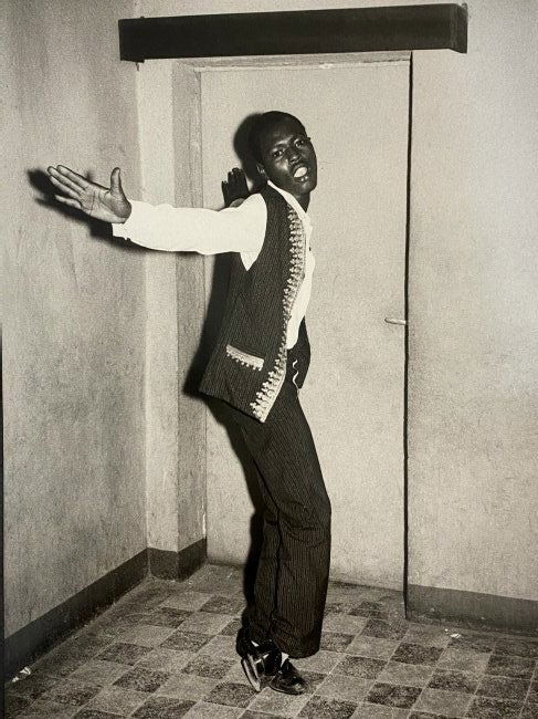 Malick Sidibe Dance with a Smile Photo Litho: MALICK SIDIBE (1935-2016) Dance with a Smile Photo litho 10 1/4" x 7 1/4" Printed circa fourth quarter 20th c.