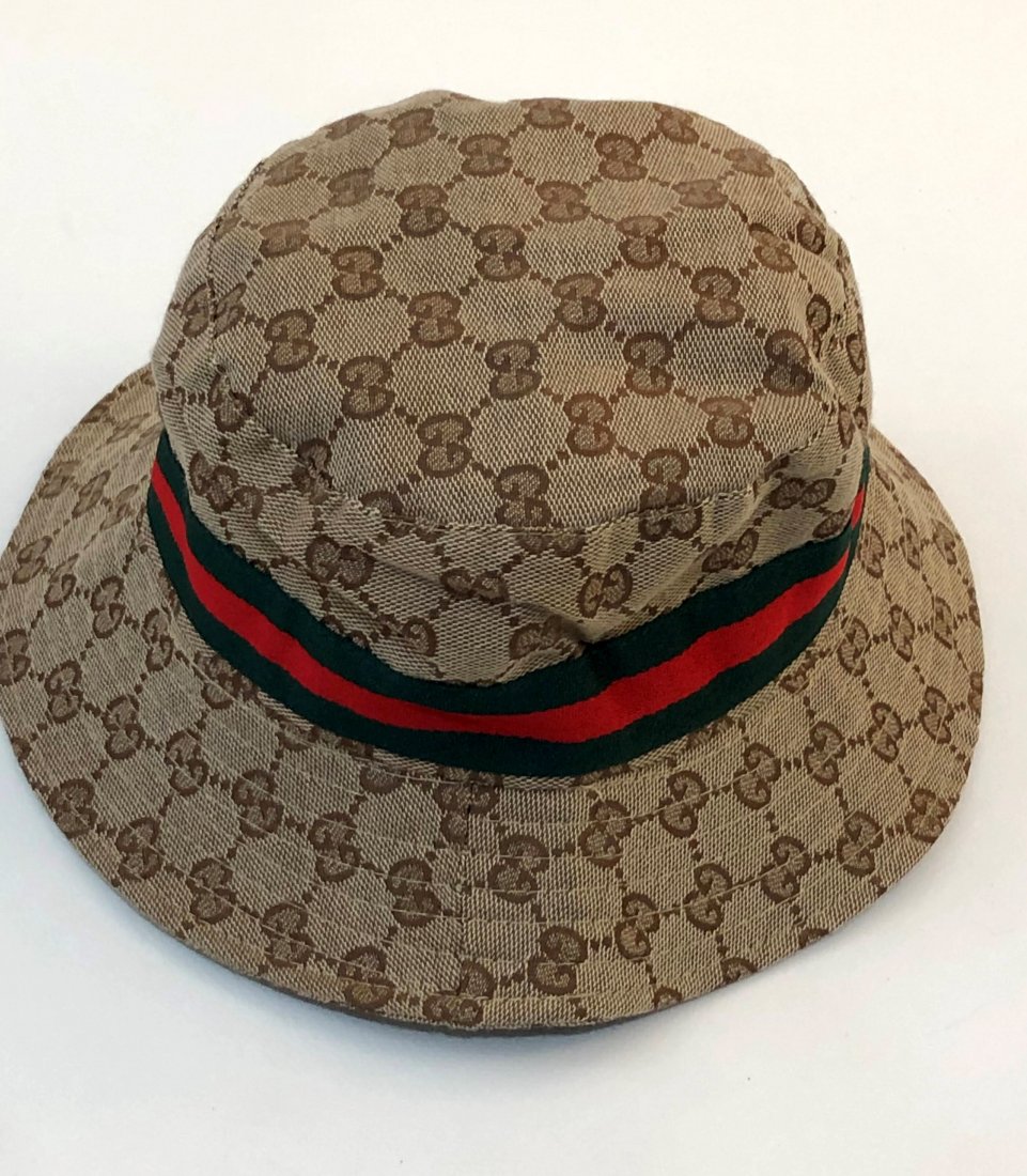 Gucci Bucket Monogram Hat: GUCCI (ITALIAN) Monogram hat issued by Gucci