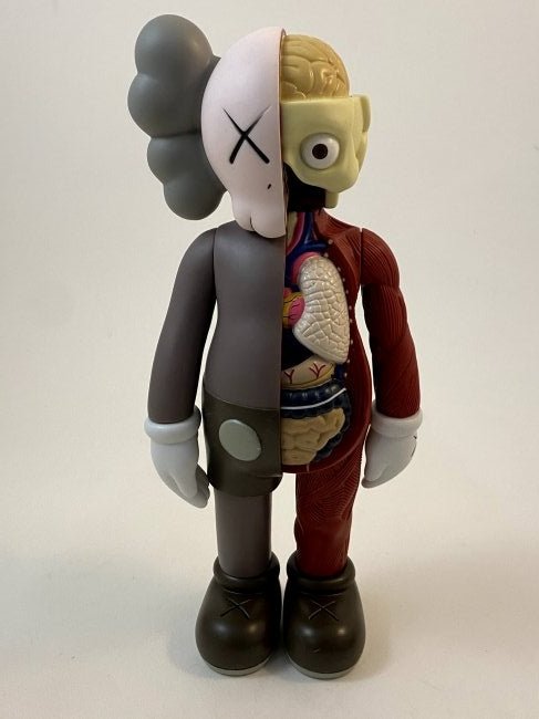 Kaws - Dissected Companion Figure: KAWS (B. 1974) Dissected Companion Painted cast vinyl 14-3/4" x 6-1/4" x 3-1/4" Stamped on the underside of the feet Produced by Medicom Toy and OriginalFake, Tokyo