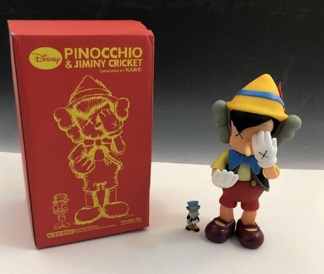 Kaws Pinocchio & Jiminy Cricket 2010: KAWS (B. 1974) Pinocchio & Jiminy Cricket Cast Vinyl Stamped to bottom - Medicom Toy, 2010, China, and Disney - Kaws 10" x 5"