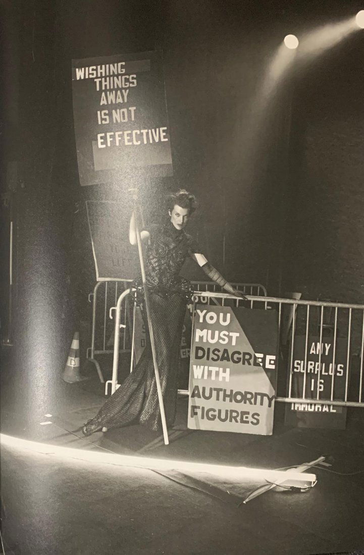 Peter Lindbergh (Mills Jovovich, Paris) Photo-Litho: PETER LINDBERGH (1944-2019) Mills Jovovich (in collaboration with Jenny Holzer), Paris, 2012 Vogue Italia Photo-Litho 13 1/4" x 9 1/4"