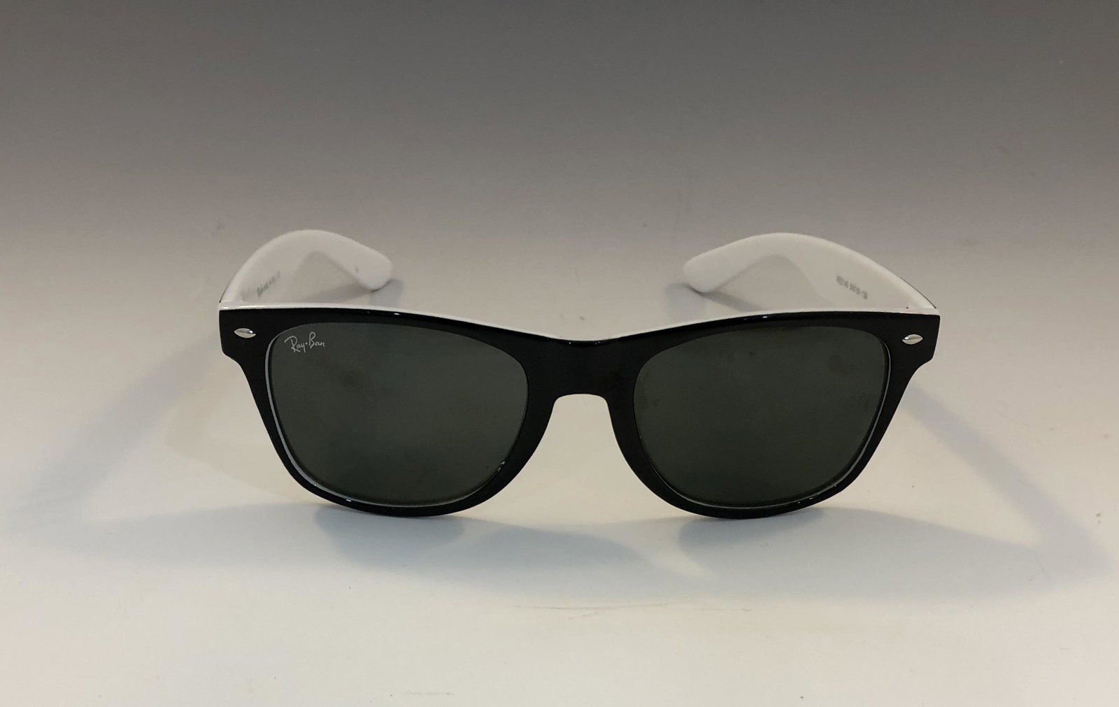 Ray Ban Sunglasses: RAY BAN Sunglasses issued by Ray Ban
