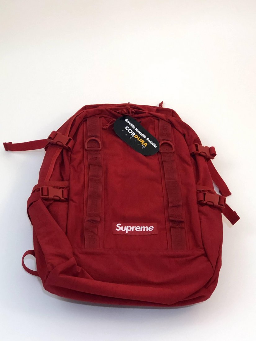 Supreme Red Backpack: Backpack issued by Supreme (brand new) ; 19" length