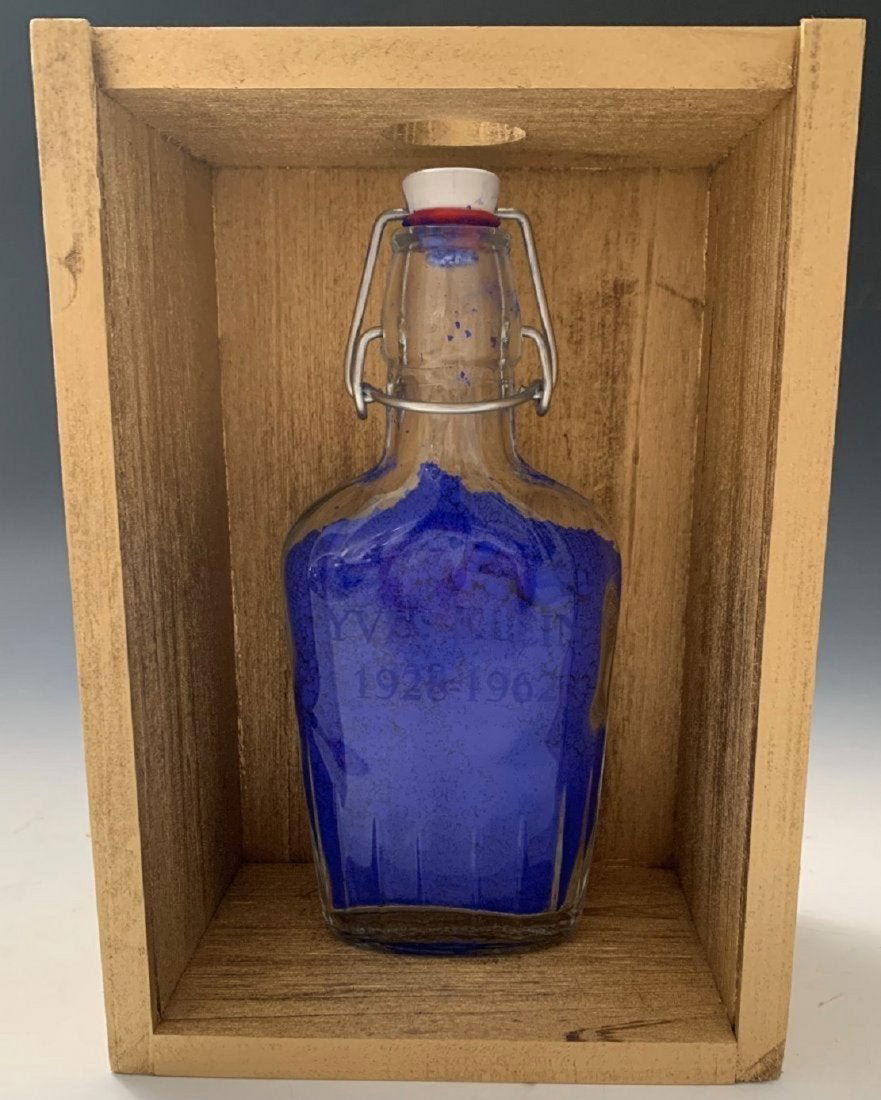Yves Klein Blue Pigment From Artists Studio: YVES KLEIN (1928-1962) Untitled Pigment presented in glass bottle Glass etched with artist's name 9 1/2" x 6 1/2" case; glass: 8" x 3" Pigment directly from artist's studio, gifted from Ms. Klein to a