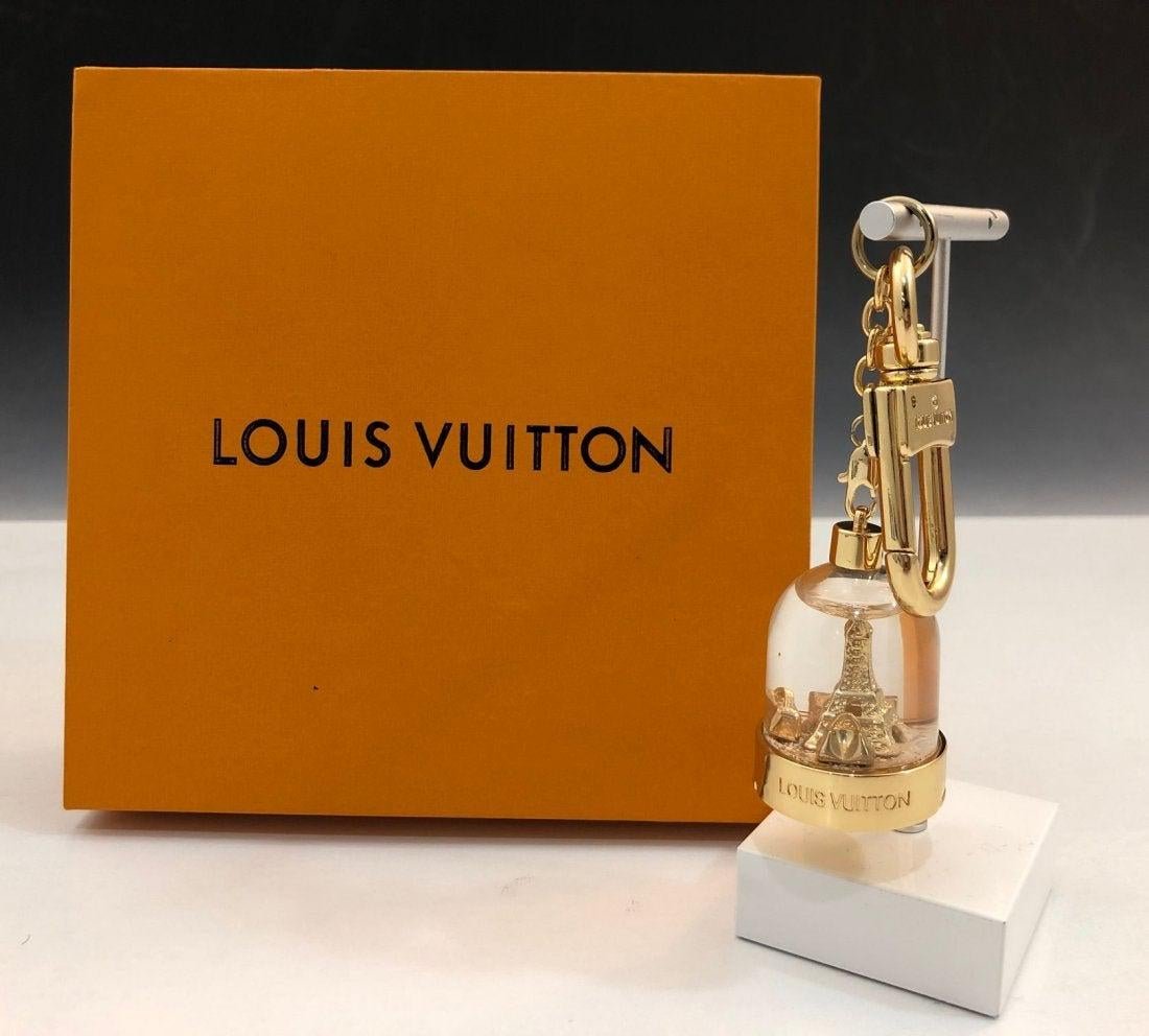 Louis Vuitton Xmas Bag Charm and Key Holder: Xmas bag charm and key holder issued by Louis Vuitton, stamped to bottom and lock, box included