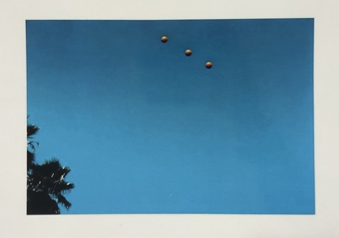 John Baldessari (Throwing Balls) Photograph: JOHN BALDESSARI (1931-2020) Throwing Three Balls in the Air to Get a Straight Line (Best of Thirty-Six Attempts) Print on paper 9" x 12"