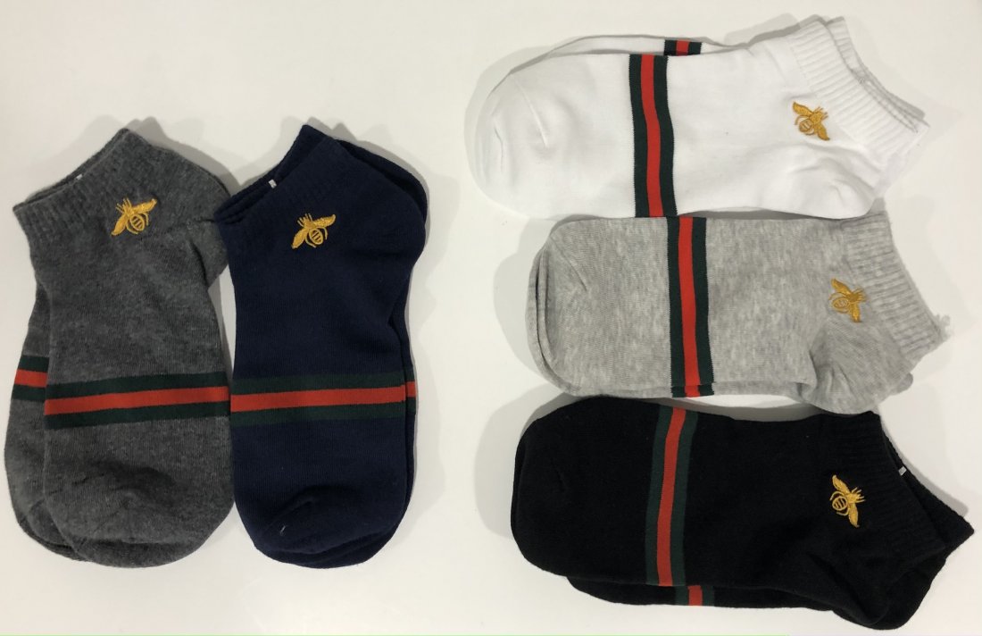 5 Pairs of Gucci Socks: GUCCI (ITALIAN) 5 pairs of bee motif socks, Gucci