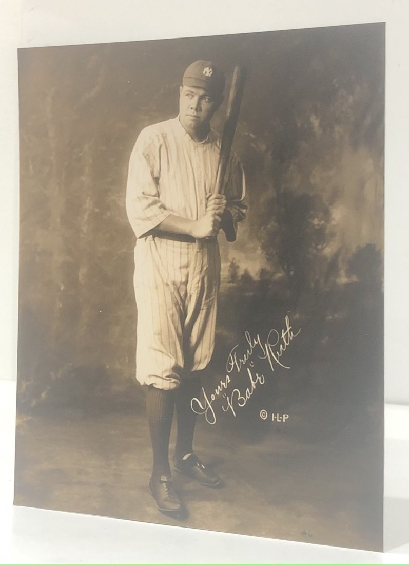 Photograph of Babe Ruth: 9 3/4" x 7 3/4", photograph of Babe Ruth, later printing. Signed in the plate.