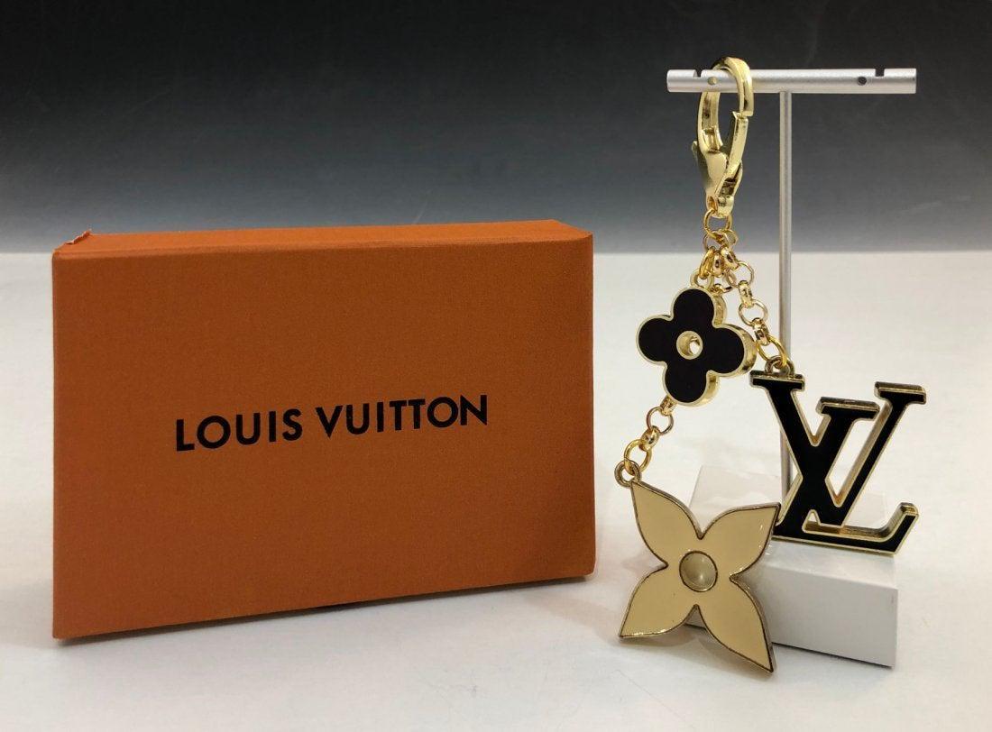 Louis Vuitton Keychain: LOUIS VUITTON (PARIS) Keychain issued by Louis Vuitton, stamped, includes box