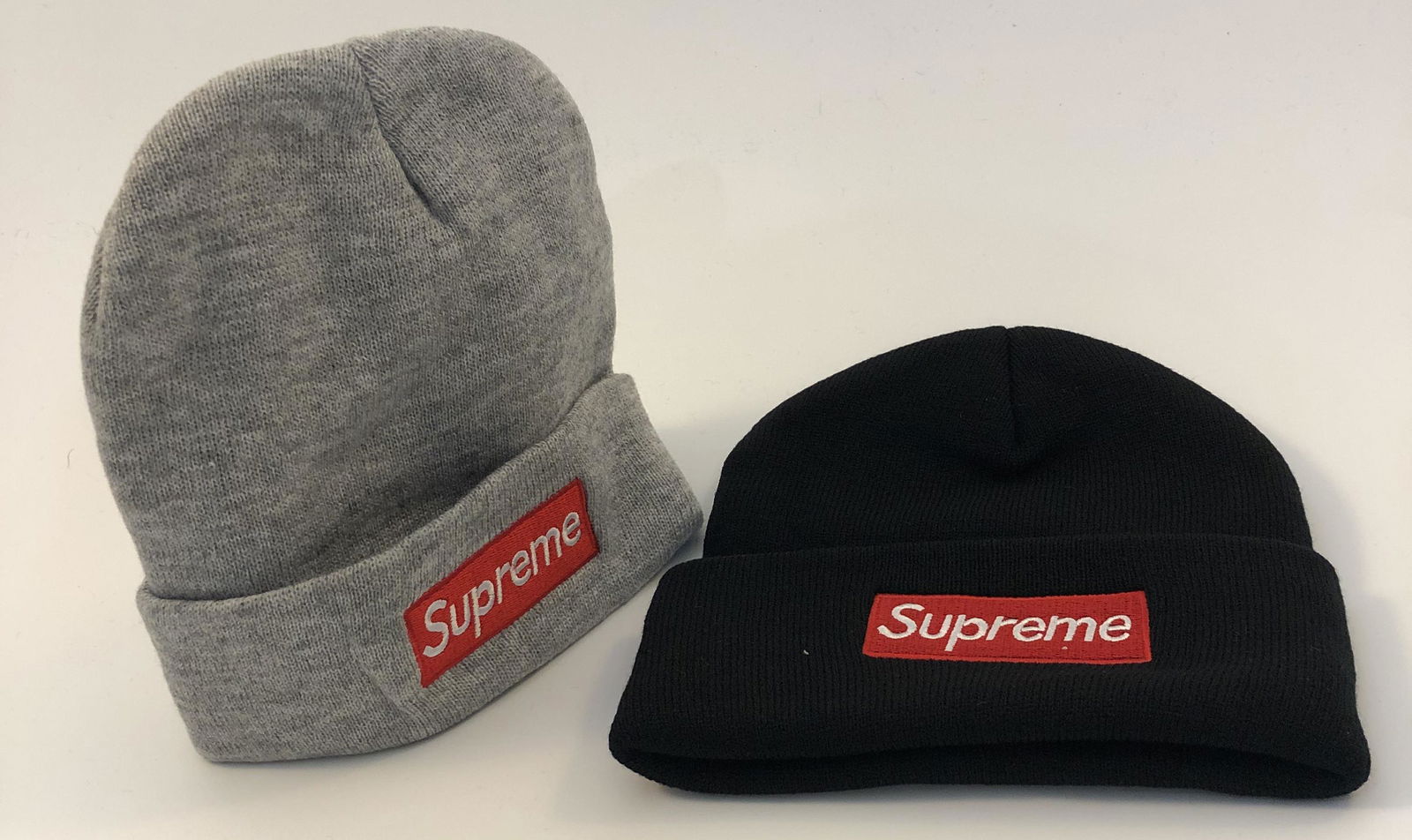 Supreme Winter Caps: SUPREME Winter caps issued by Supreme Total of 2, 1 in black and 1 in gray.