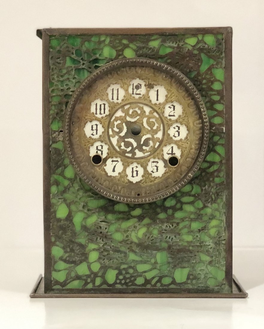Tiffany Studios Bronze & Favrile Grapevine Mantle Clock: TIFFANY STUDIOS (20TH CENTURY) Bronze & Favrille glass grapevine mantle clock issued by Tiffany Studios 11" height, stamped "Tiffany Studios New York"
