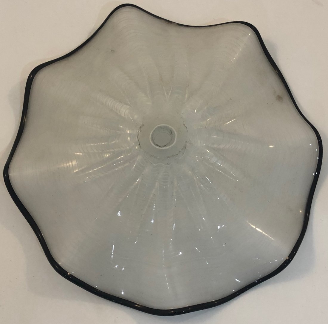 Attributed to Dale Chihuly Small Plate: ATTRIBUTED TO DALE CHIHULY (B. 1941) Clear with black trim, small plate (8")