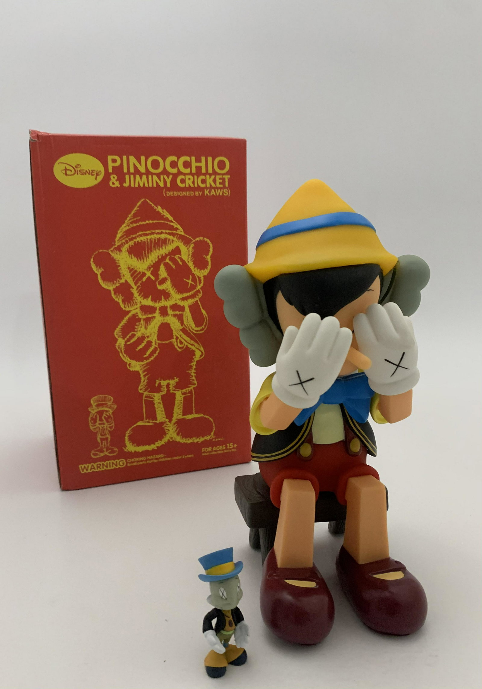 Pinocchio & Jimmy Cricket Figures.: Pinocchio & Jimmy Cricket Figures. Measure at heights of 10 inches and 2.25 inches.