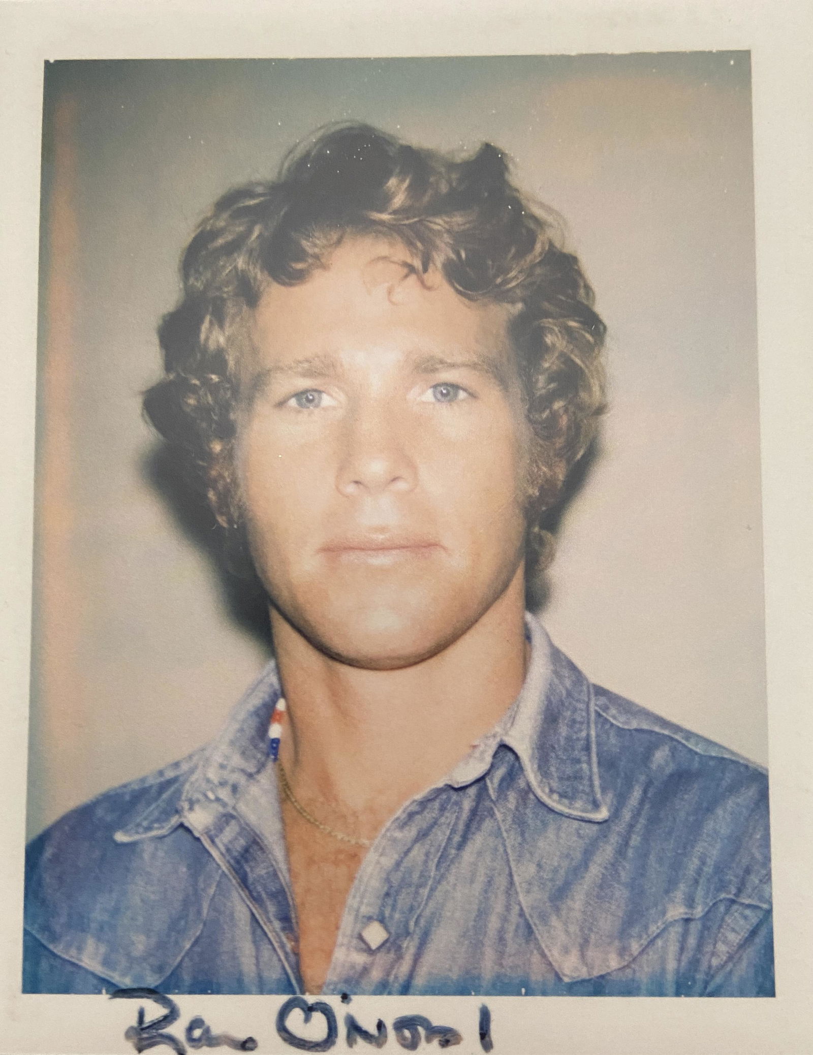 Andy Warhol "Ryan O'Neal, 1971" Polaroid Print: Andy Warhol Limited Edition "Ryan O'Neal, 1971" Polaroid Print. Measures 6 x 7.5 inches. Mounted to same size cardstock.