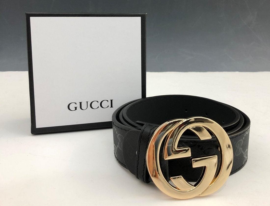 Gucci Monogramed Black Leather Belt: Belt issued by Gucci with box