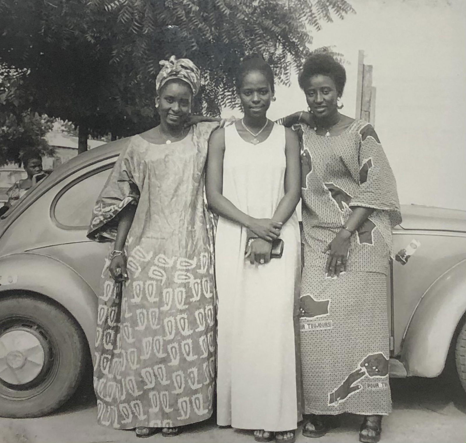 Malick Sidibe (Three Friends) Glossy Photo-Litho: MALICK SIDIBE (1935-2016) Three Friends Before Town Hall Glossy photo-litho Printed circa later 20th c. 7" x 7" Mounted to same sized cardstock