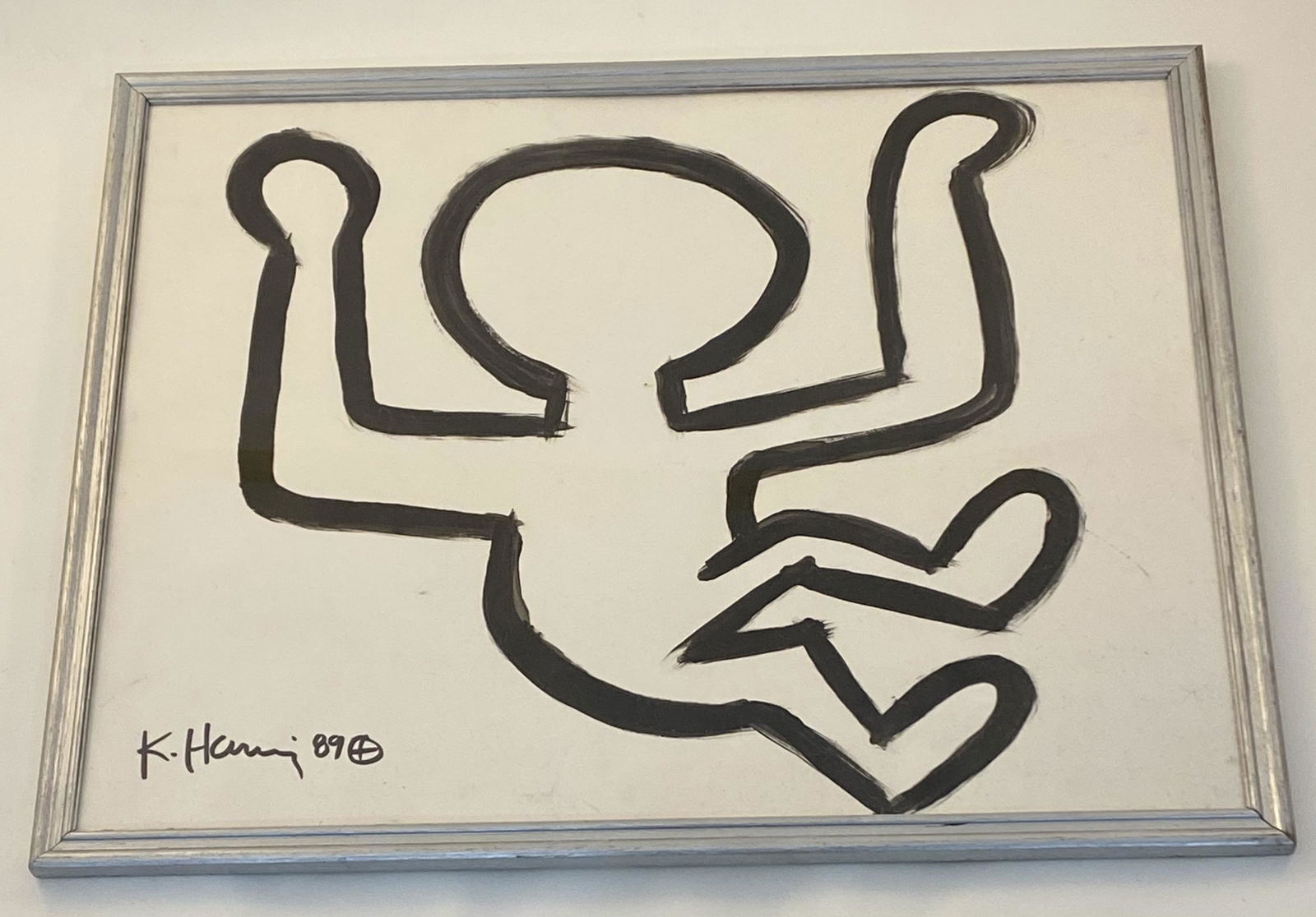 Keith Haring (Untitled) Acrylic on poster board 1989: KEITH HARING (1958-1990) Untitled acrylic paint on poster board 22" x 28" sight; frame: 24" x 30" Signed and dated lower left side Plaque to verso "Bequeathed by the estate of Kenneth L. Lay"