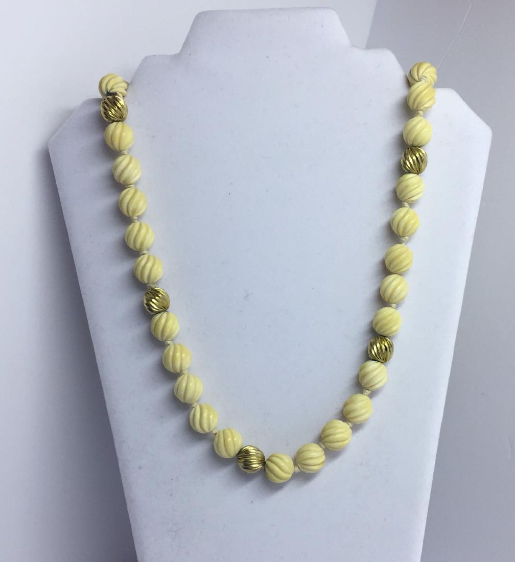 1940's 14k gf carved 14mm bone bead necklace #451: measures: 34" long gemstone: 14mm bone & 12mm gold filled beads condition: good