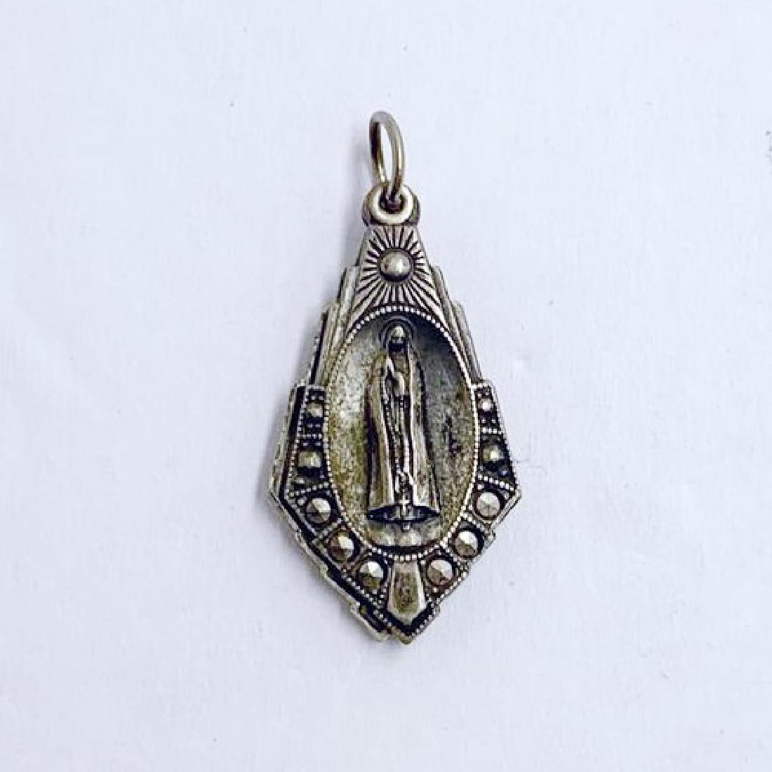 silver FATIMA marcasite pendant #170: measures: 1 3/8" long by 5/8" wide gemstone: marcasite condition: good