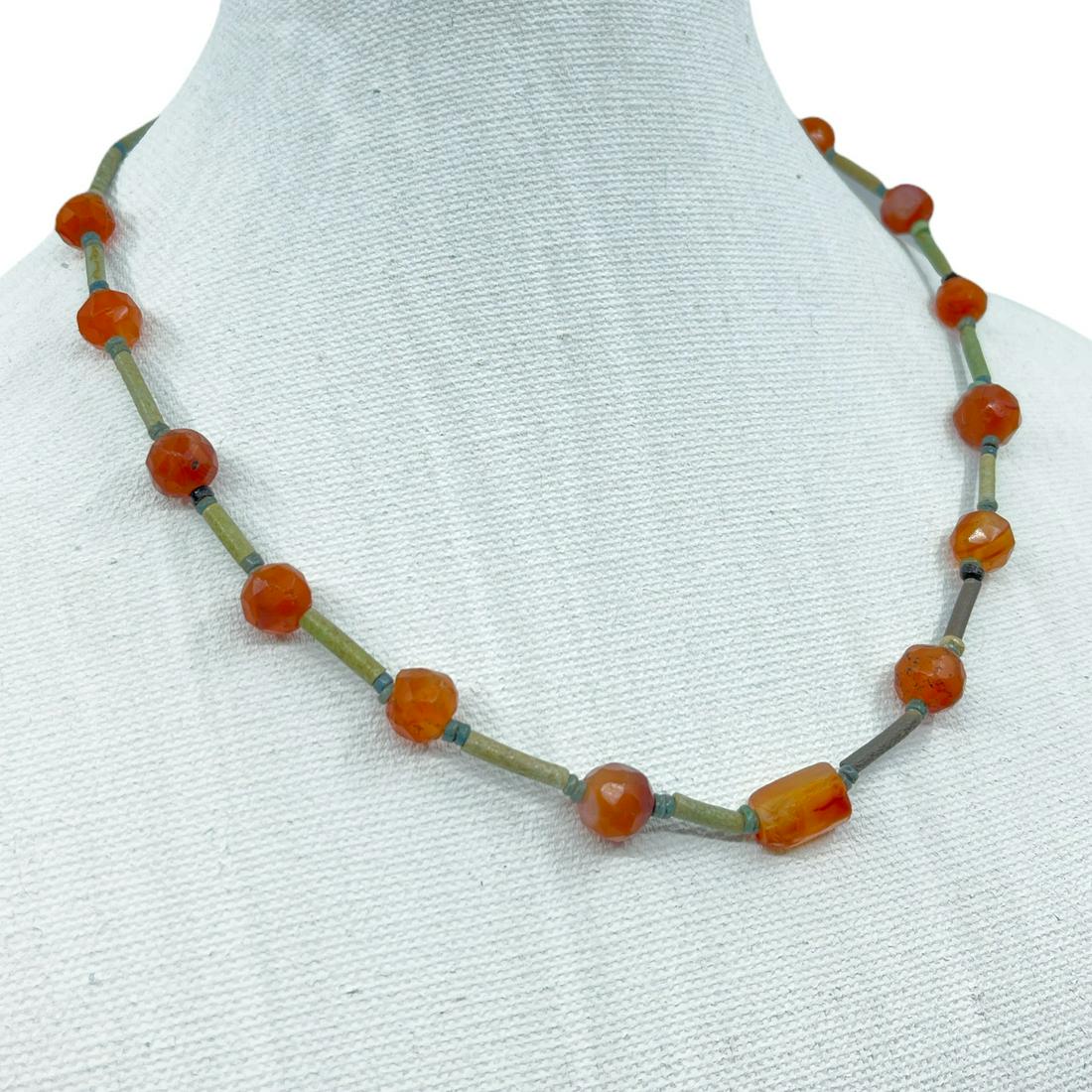 Afghan carnelian turquoise bead necklace: Measurements: 20 1/2" long beads: 2mm turquoise & 9mm, 10mm & 12x9mm carnelian In good condition