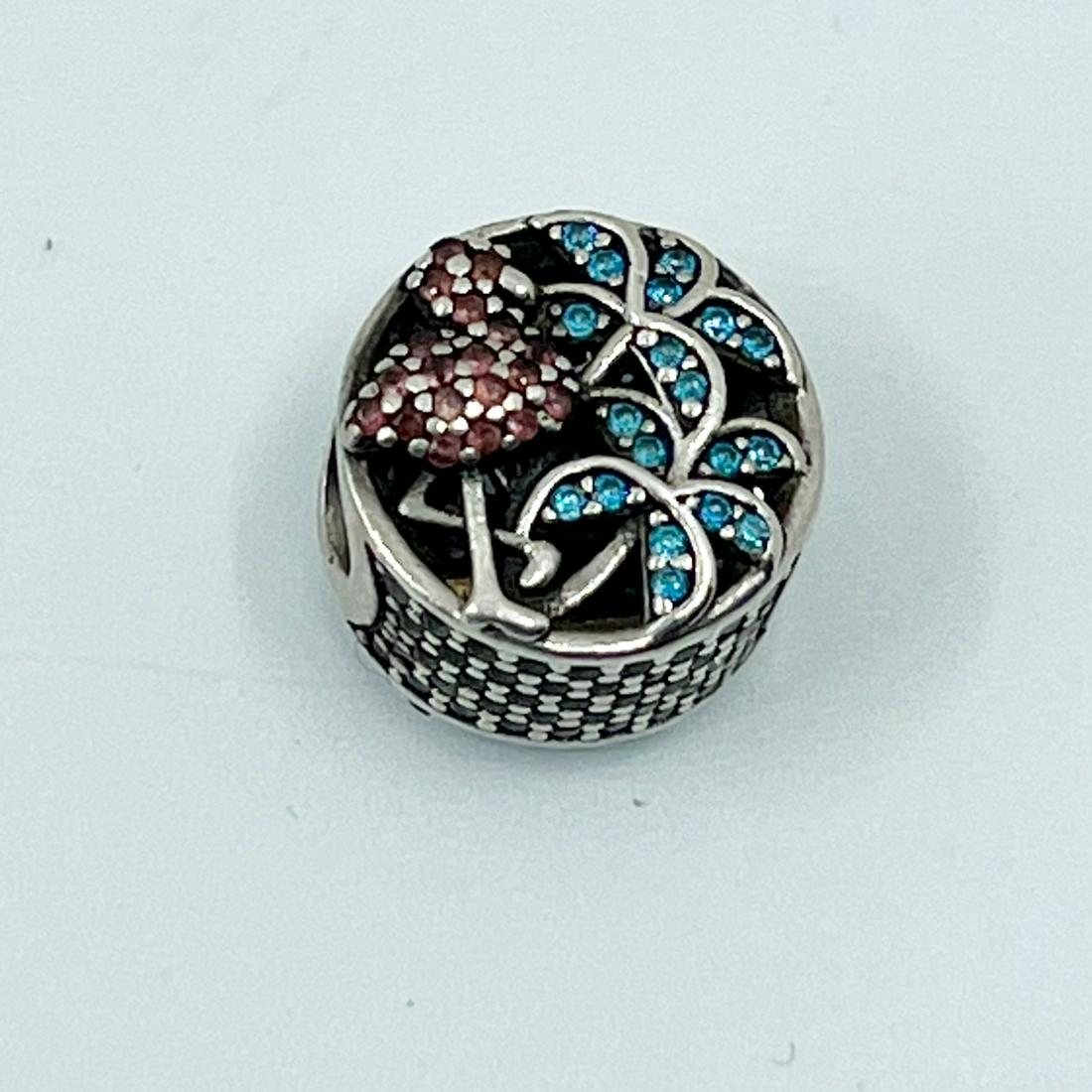 PANDORA tropical flamingo sterling silver charm: Measures: 1/2" wide Crafted with cubic zirconia hallmark: 925 ale In good pre-owned condition