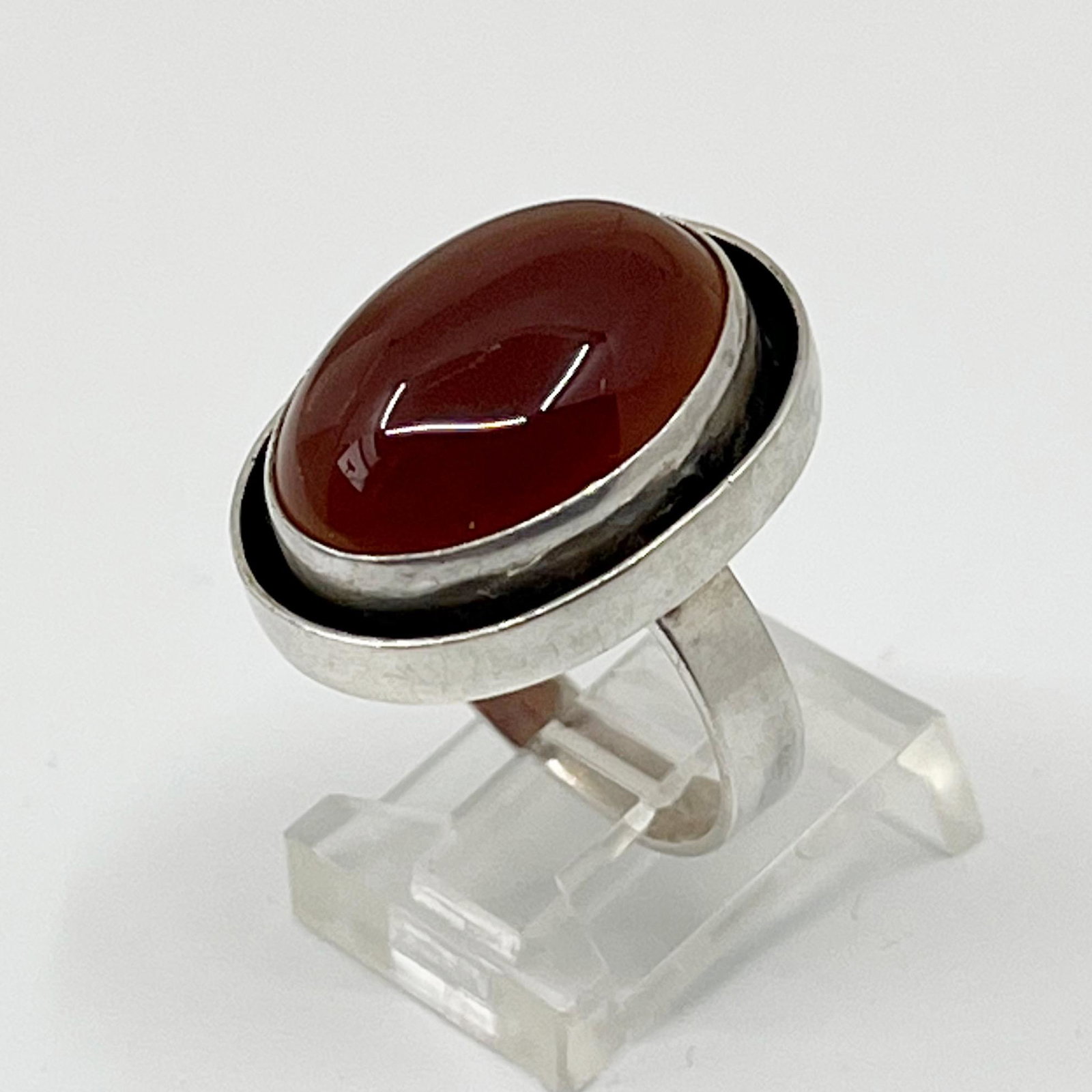 Sterling silver carnelian ring: Measures: 7/8" wide size: 7 Crafted with 19x14mm carnelian Condition: like New