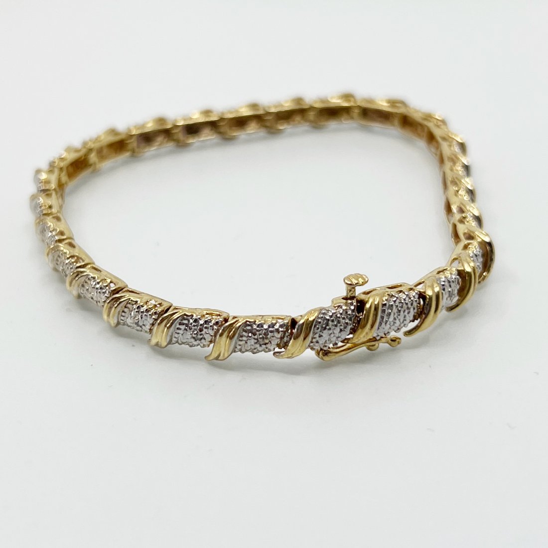 Gold Vermeil sterling silver diamond tennis bracelet: Measures: 7 1/4" long by 6mm wide Crafted with diamond Condition: New