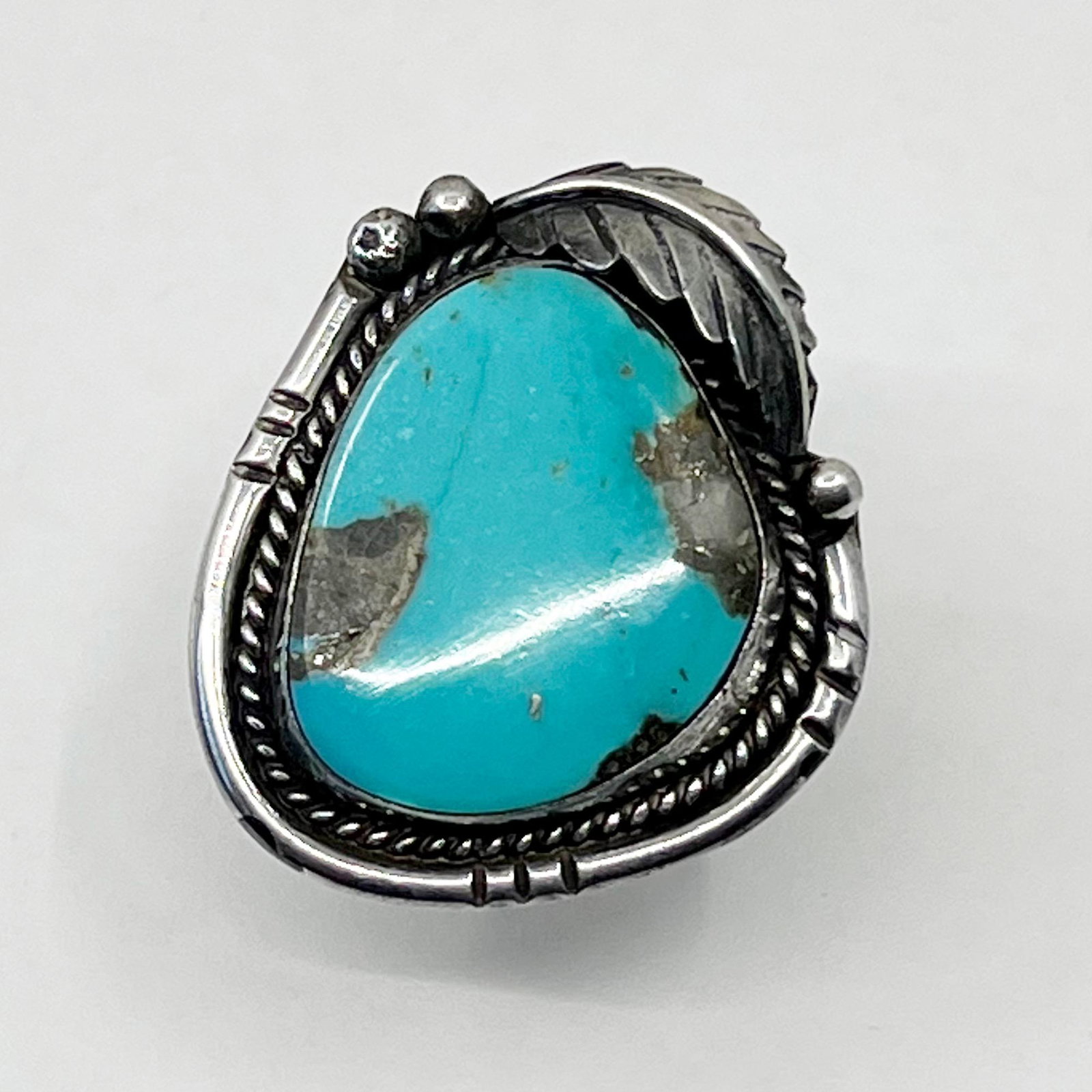 Steven Apachito Navajo sterling silver turquoise ring: Measures: 1 3/8" wide size: 8 Crafted with 28x22mm turquoise Hallmark: SA Condition: like new SKU-185