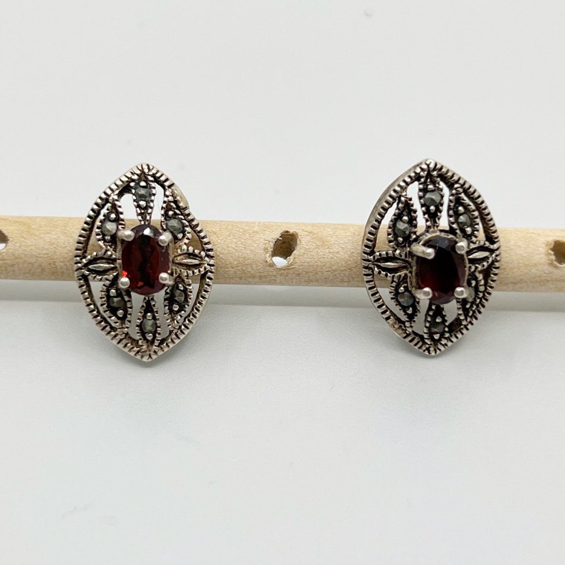 Sterling silver garnet & marcasite earrings: Measures: 3/4" long by 1/2" wide Gemstone: garnet & marcasite Hallmark: 925 Condition: Like New SKU-280