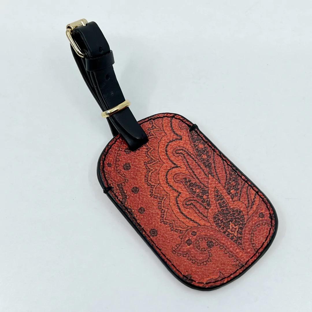 ETRO Leather Luggage Tag: Measurements: 5 1/2" long by 2 1/8" Wide Material: leather Signed: Etro Condition: New SKU-5063